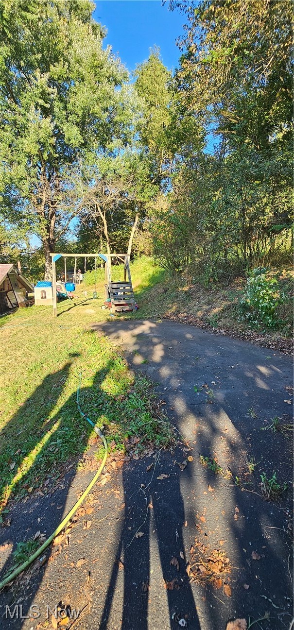 327 Fairview Road Chester, WV 26034 - Photo 23 of 29 View of green lawn featuring a playground
