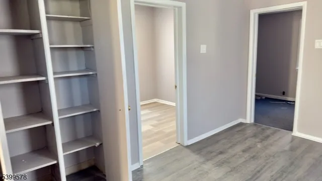 a view of a room with rack on the wall