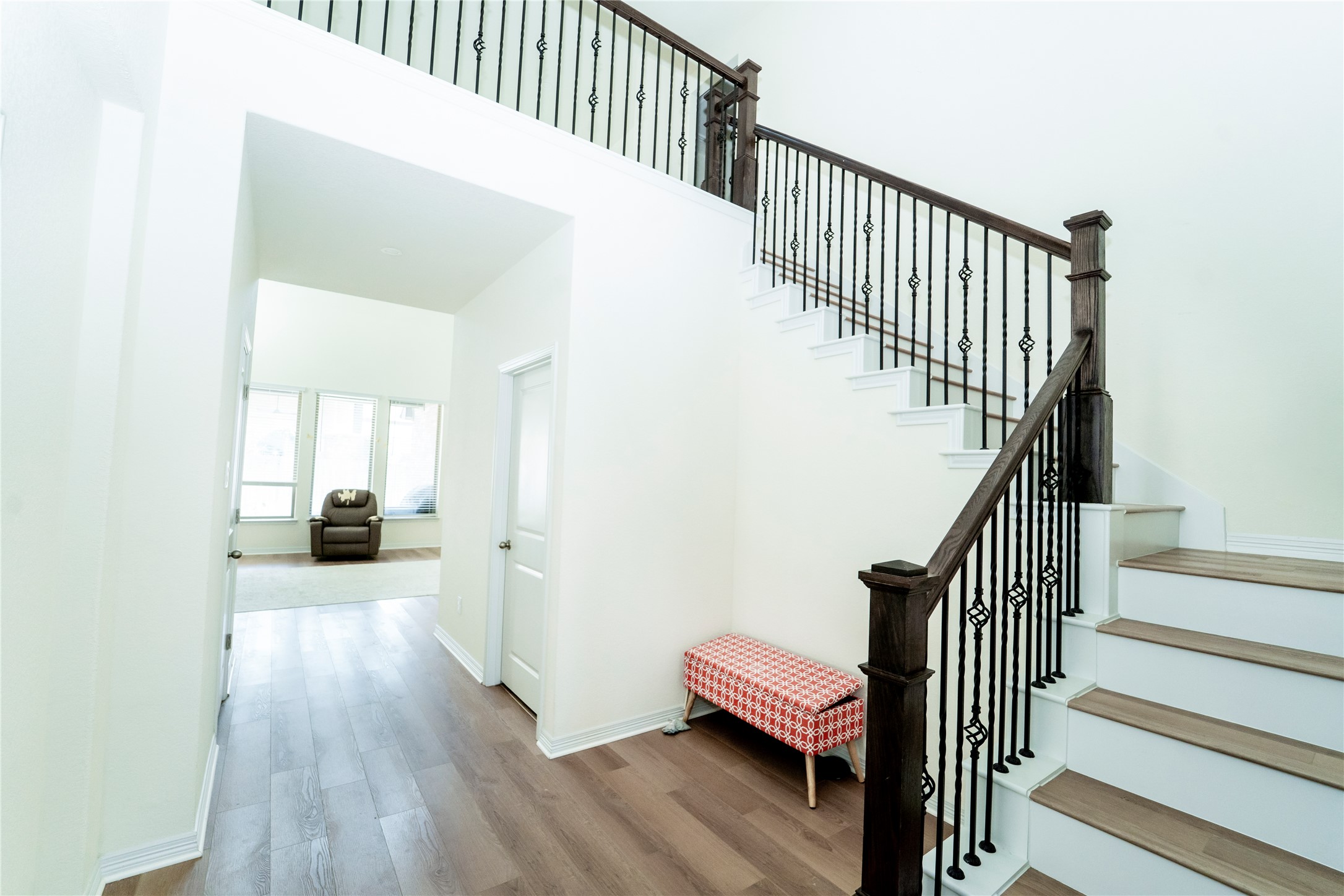 20813 Carries Ranch Road Pflugerville, TX 78660 - Photo 10 of 29 Stairway featuring wood finished floors and baseboards