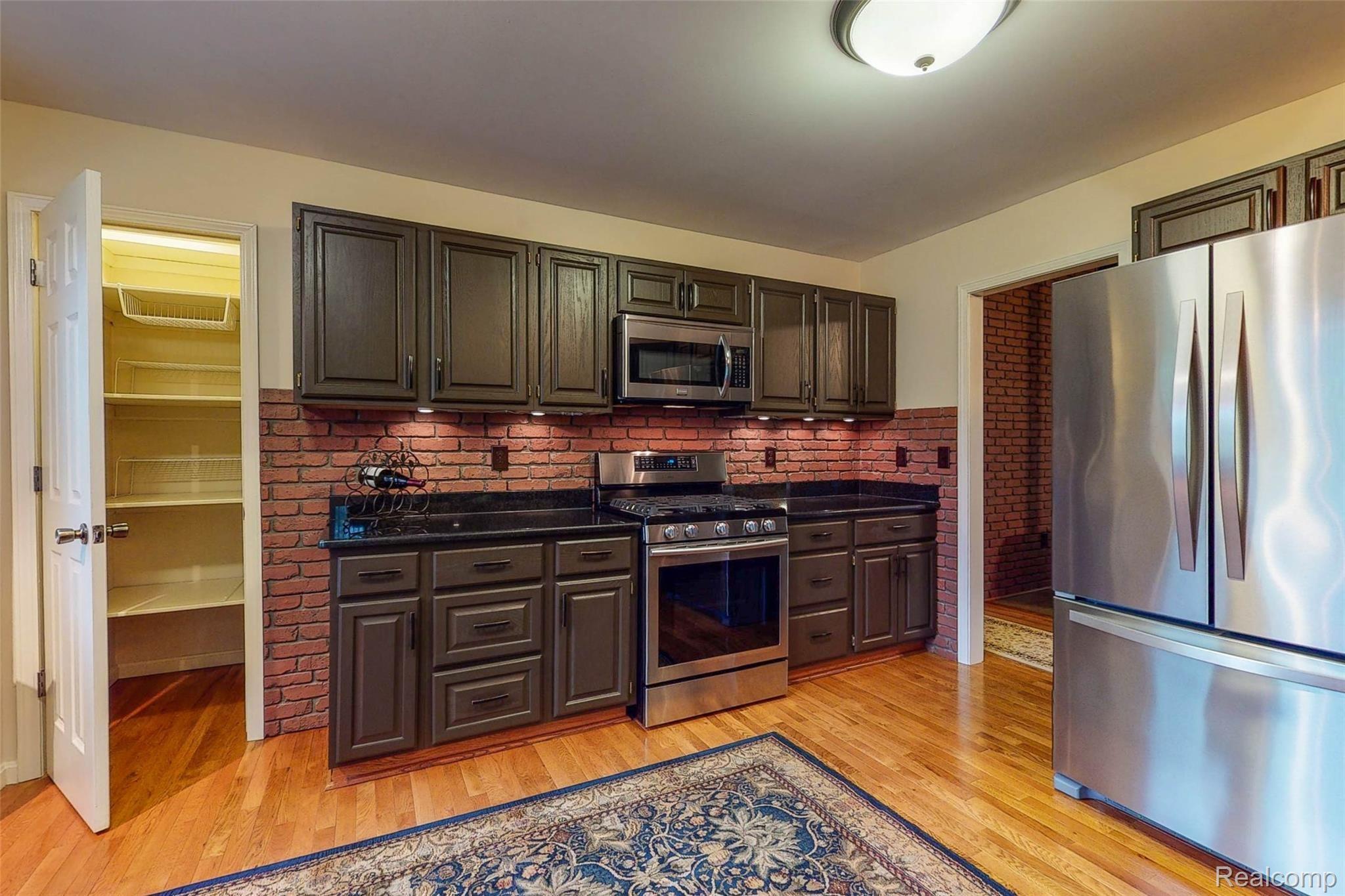5520 Lowe Road Fowlerville, MI 48836 - Photo 37 of 86 5520-W-Lowe-Rd-14 Kitchen.jpg