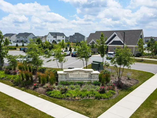 an aerial view of a house with a garden