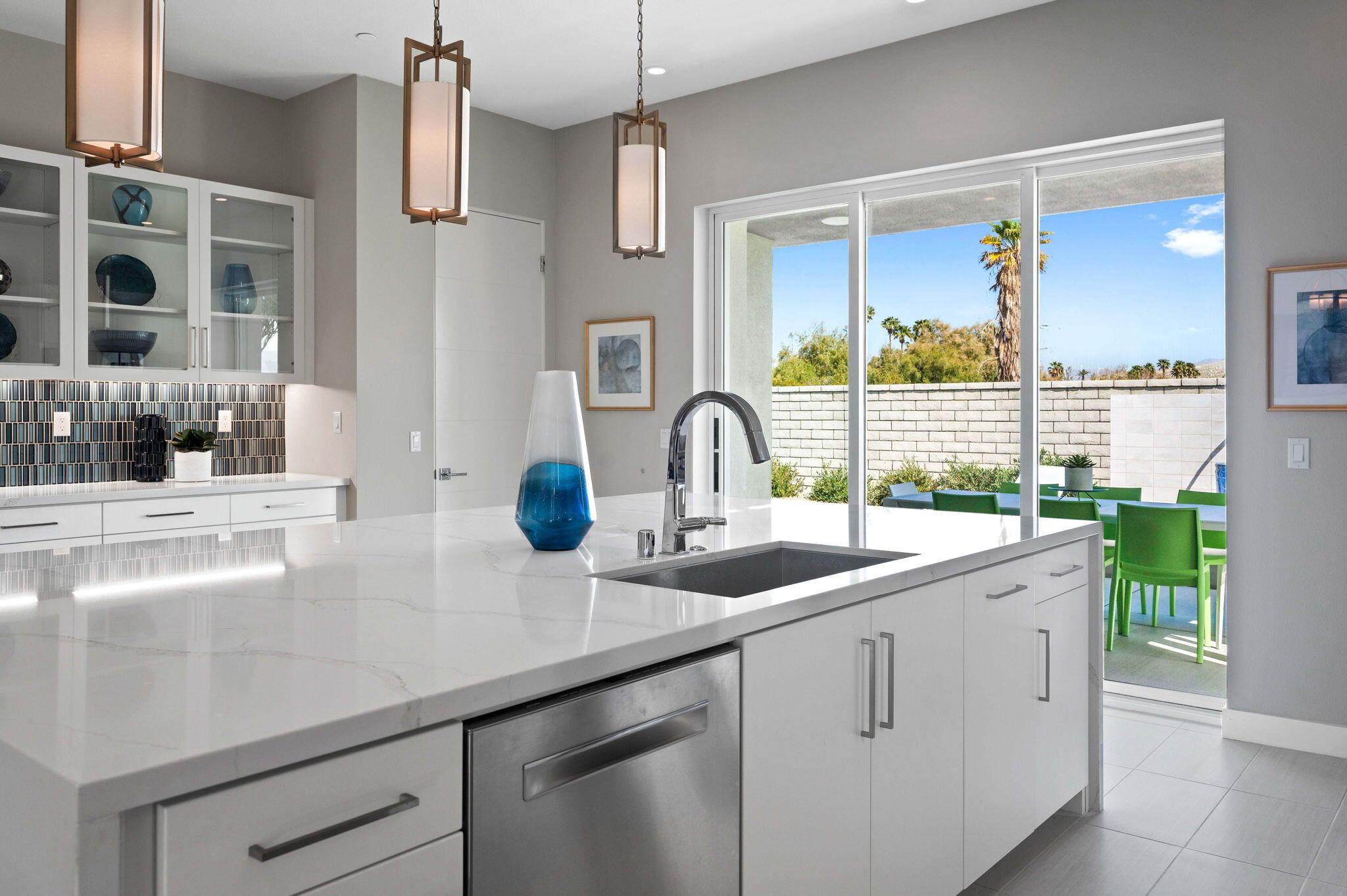 2 Iridium Way Rancho Mirage, CA 92270 - Photo 11 of 55 a kitchen with a sink and large window