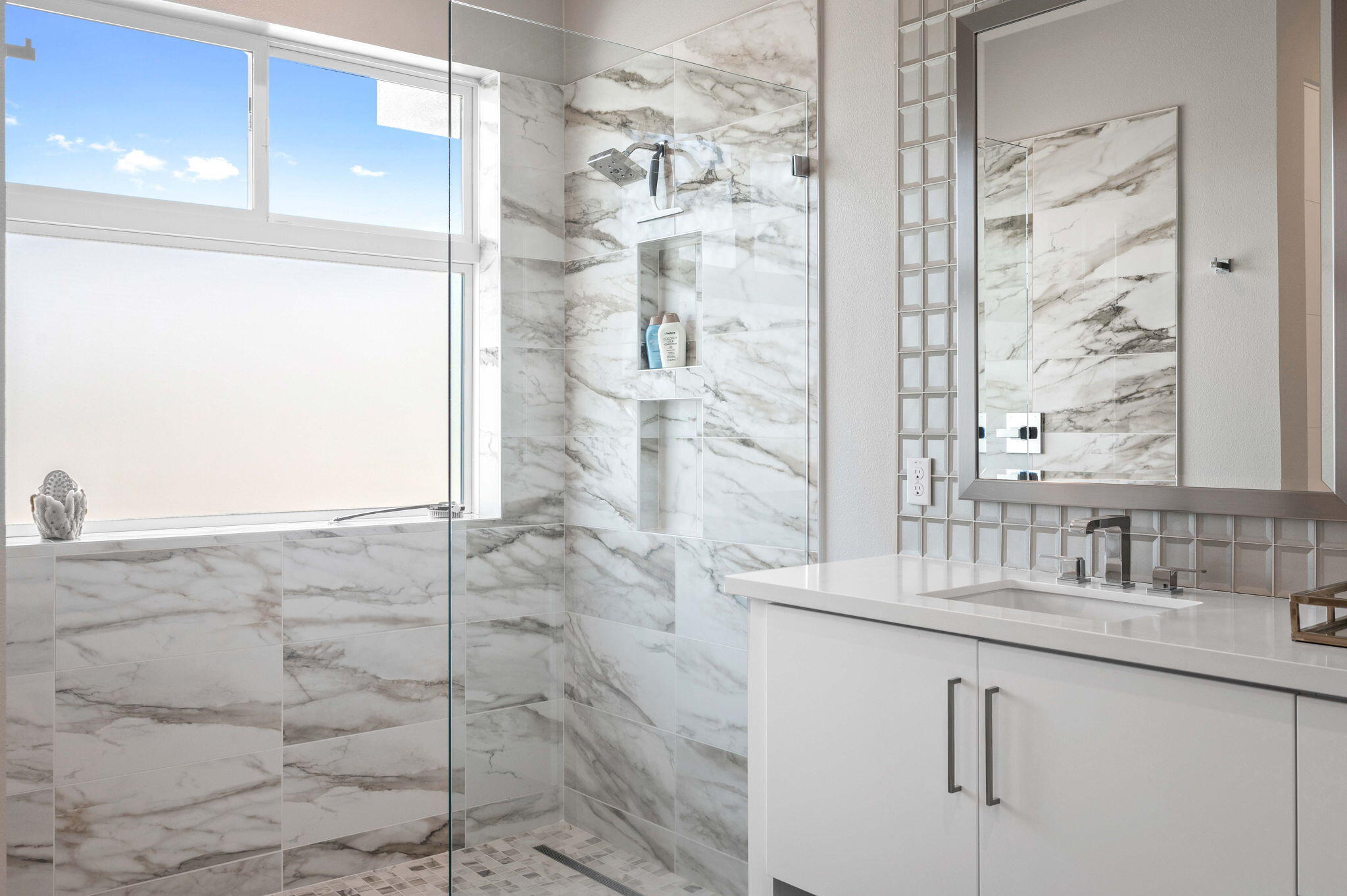 2 Iridium Way Rancho Mirage, CA 92270 - Photo 20 of 55 a bathroom with a shower and a sink