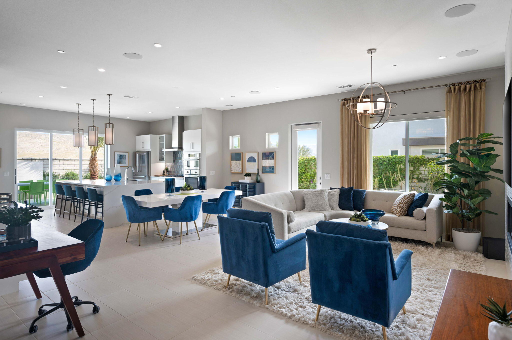 2 Iridium Way Rancho Mirage, CA 92270 - Photo 4 of 55 a living room with lots of furniture and a chandelier