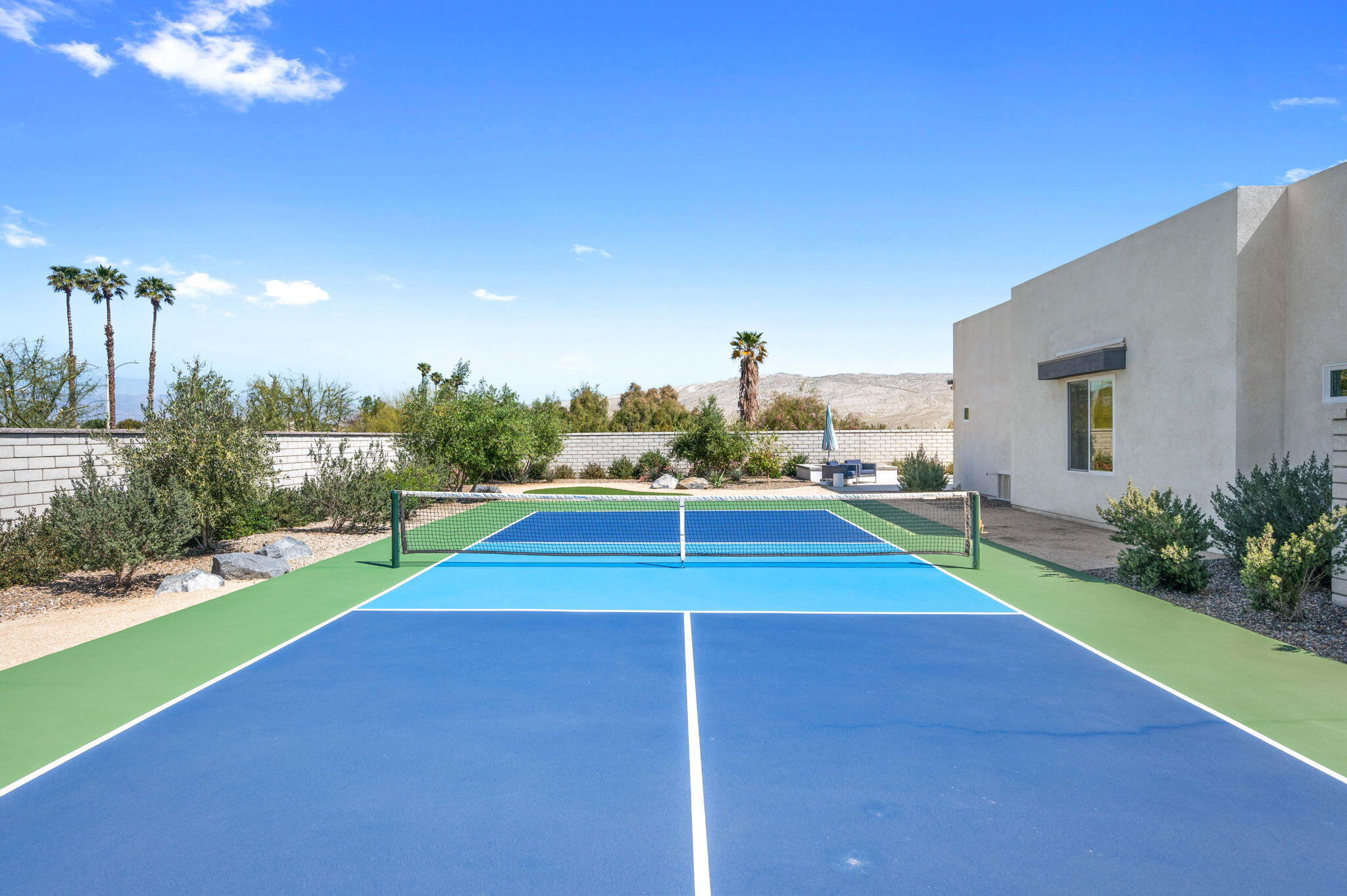 2 Iridium Way Rancho Mirage, CA 92270 - Photo 44 of 55 a view of an outdoor space and basketball court