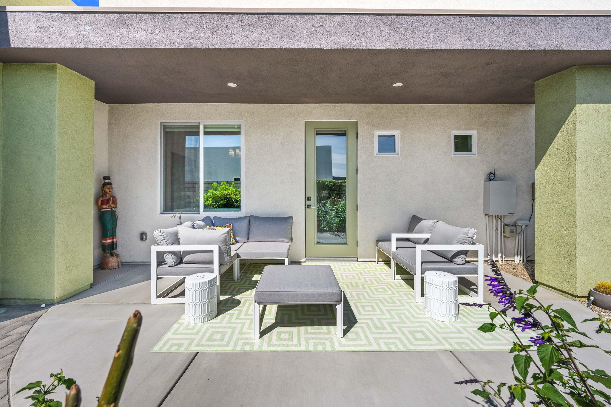2 Iridium Way Rancho Mirage, CA 92270 - Photo 47 of 55 a living room with furniture and a large window