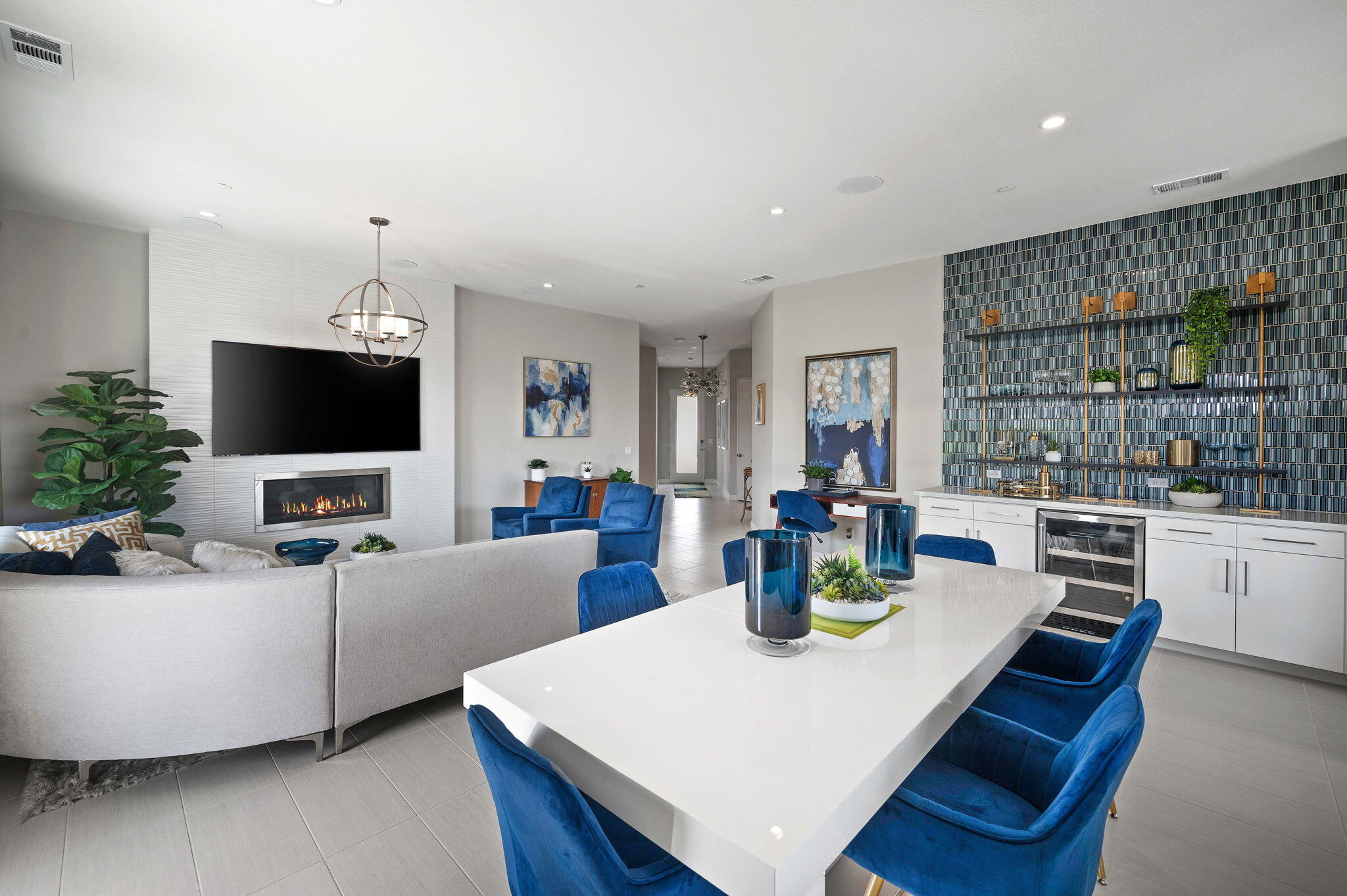 2 Iridium Way Rancho Mirage, CA 92270 - Photo 6 of 55 a living room with furniture and a flat screen tv