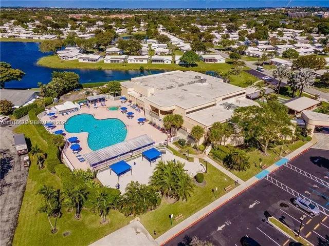 a room with pool table and flat screen tv