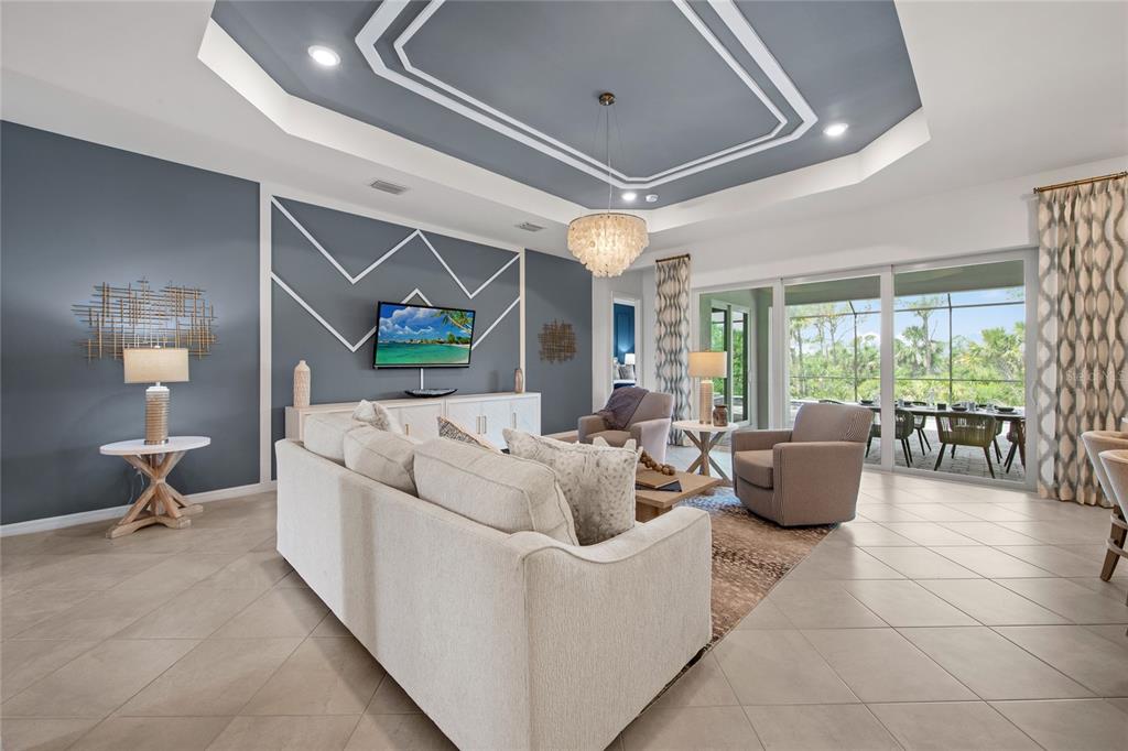 7161 Inlet Isles Lakewood Ranch, FL 34202 - Photo 5 of 29 a living room with furniture and a large window