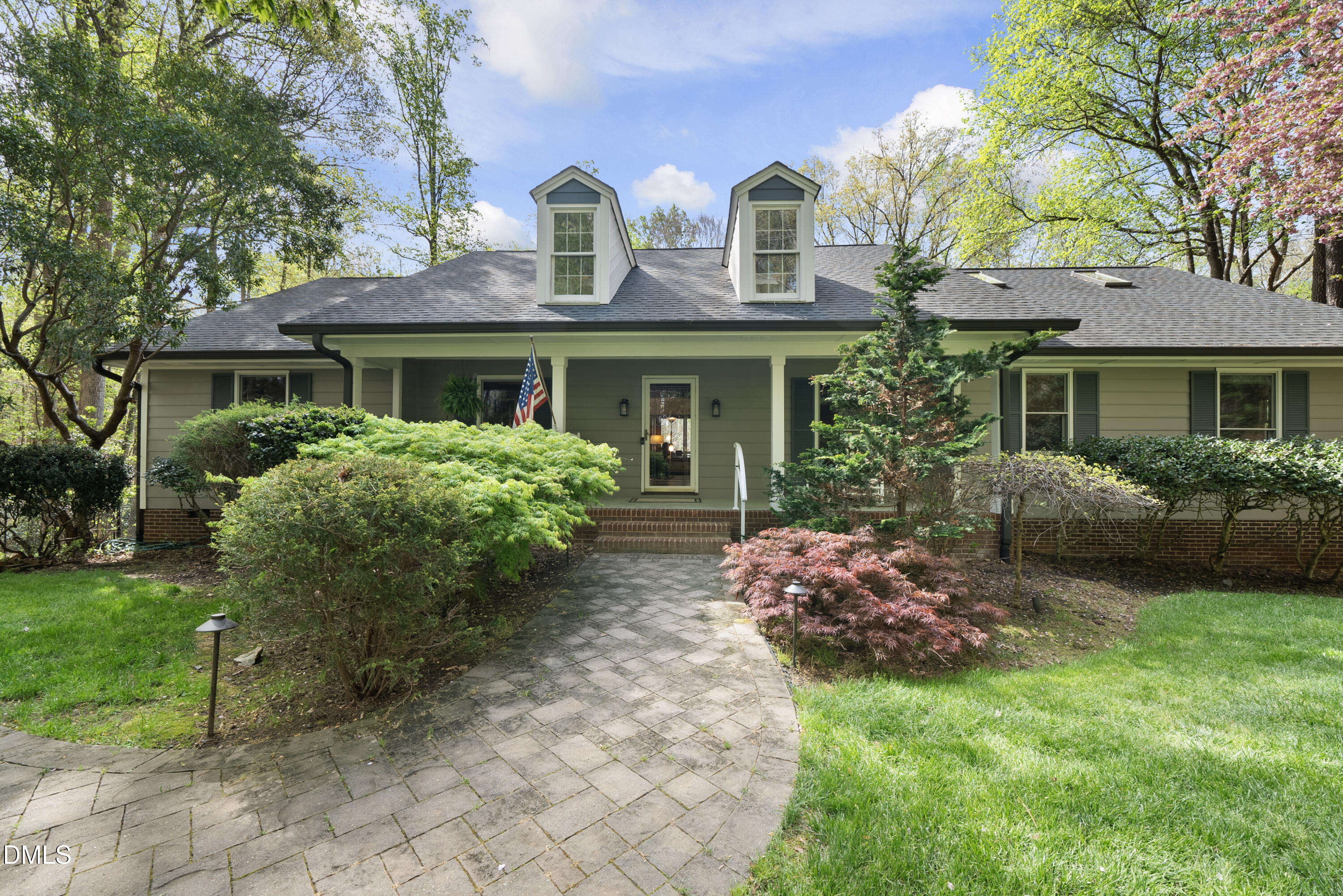 6200 Splitrock Trail Apex, NC 27539 - Photo 52 of 64 a front view of a house with garden