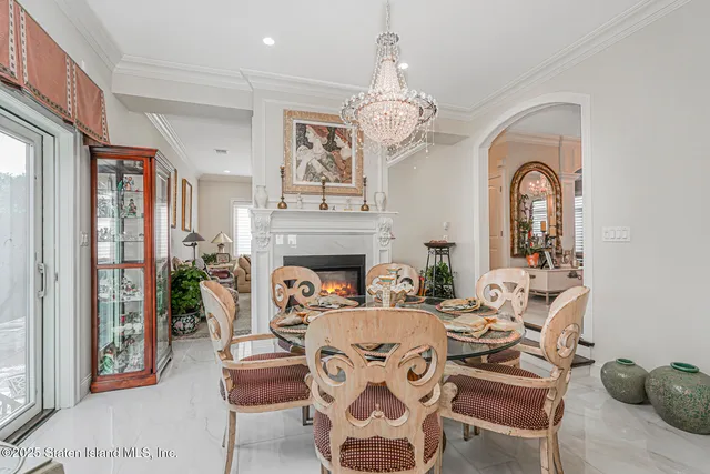 a kitchen with granite countertop a sink stove and refrigerator