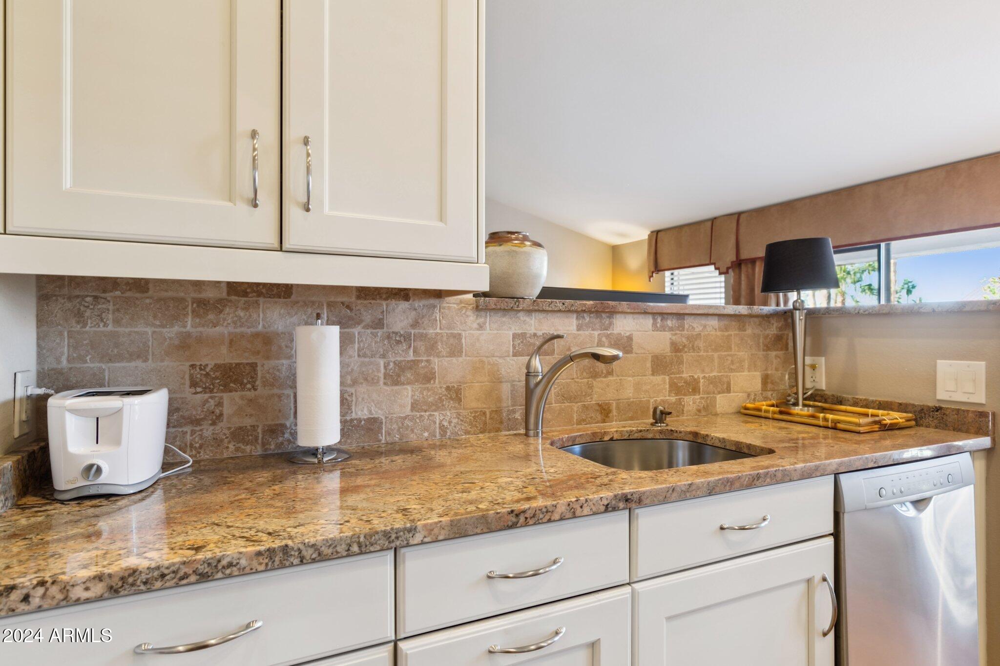 9707 East Mountain View Road, Unit 2438 Scottsdale, AZ 85258 - Photo 11 of 22 Remodeled kitchen