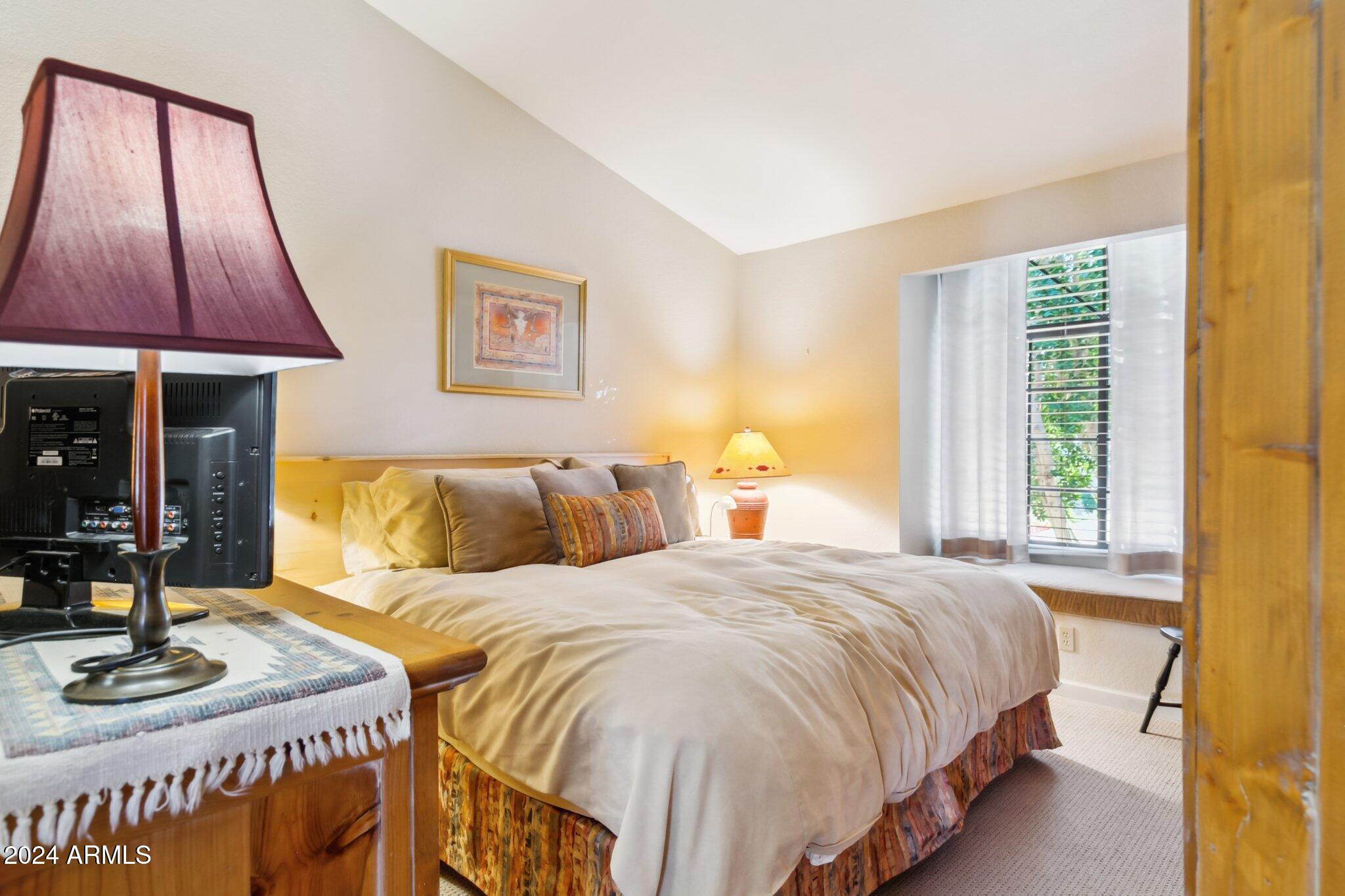 9707 East Mountain View Road, Unit 2438 Scottsdale, AZ 85258 - Photo 15 of 22 Master bedroom