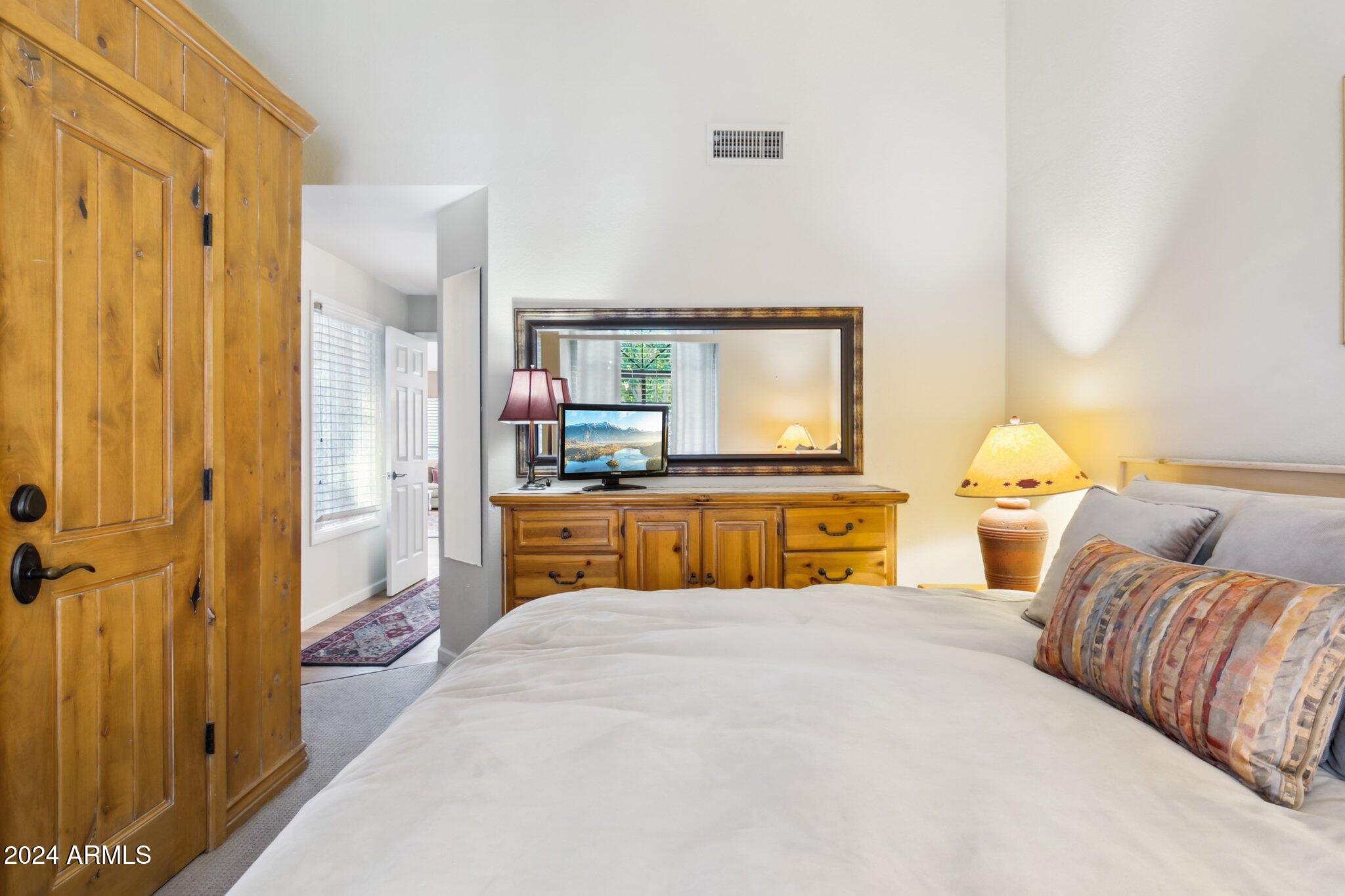 9707 East Mountain View Road, Unit 2438 Scottsdale, AZ 85258 - Photo 17 of 22 Master Bedroom