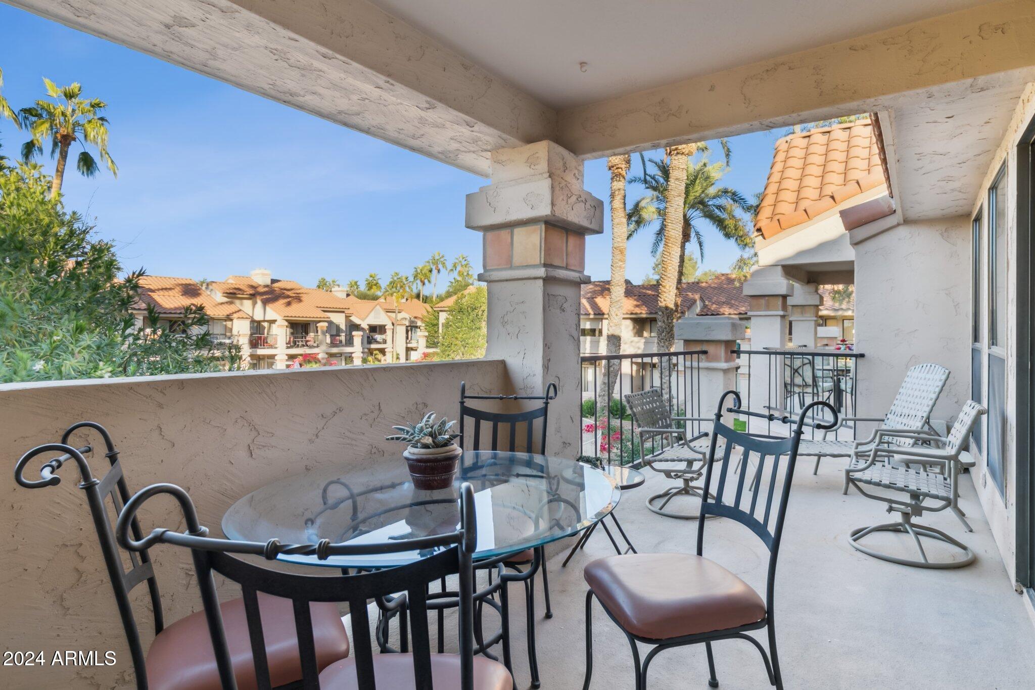 9707 East Mountain View Road, Unit 2438 Scottsdale, AZ 85258 - Photo 22 of 22 Patio adjacent to pool