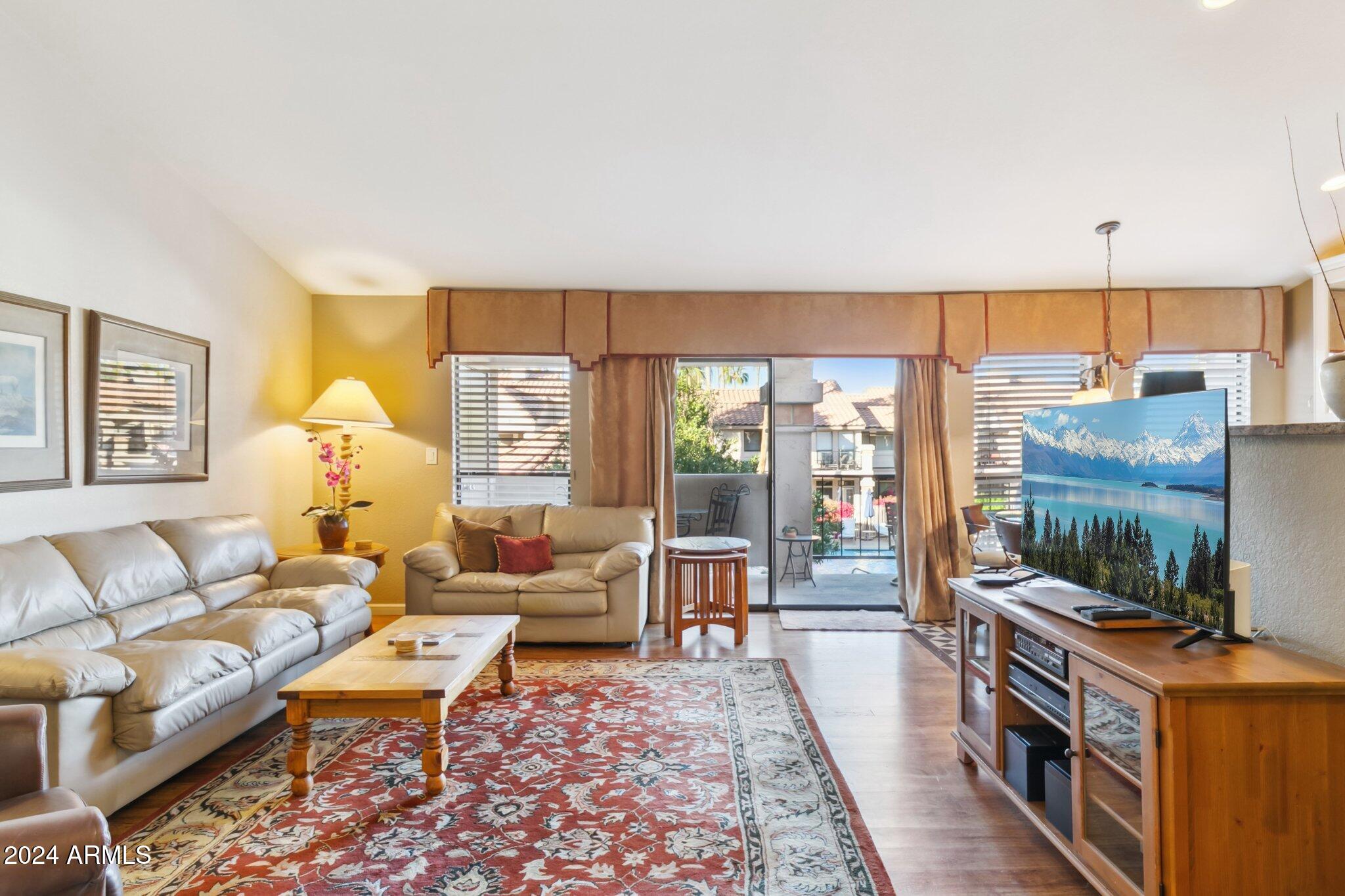 9707 East Mountain View Road, Unit 2438 Scottsdale, AZ 85258 - Photo 6 of 22 Living room