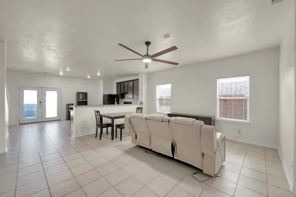 a living room with furniture and window