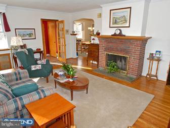 600 North Eagle Road Havertown, PA 19083 - Photo 2 of 6 a living room with furniture and a fireplace