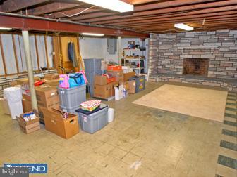 600 North Eagle Road Havertown, PA 19083 - Photo 6 of 6 a room with furniture and a fireplace