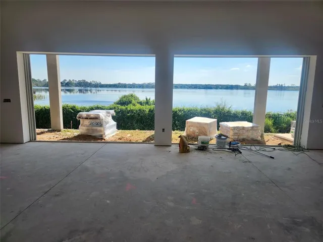 a building with table sitting space and garden view