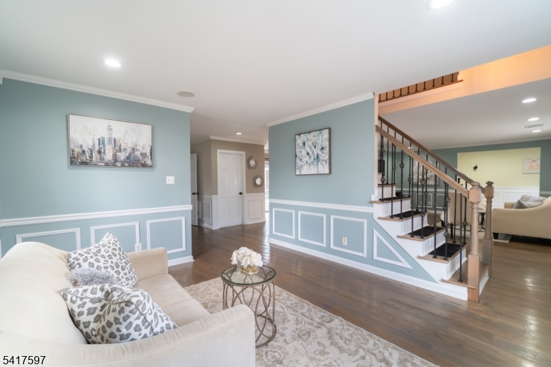 8 Dahlia Road Somerset, NJ 08873 - Photo 15 of 41 a living room with furniture and wooden floor