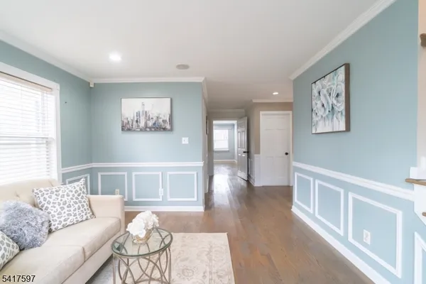a living room with furniture and a table