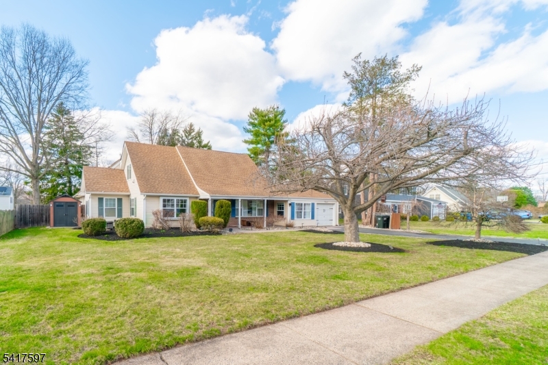 8 Dahlia Road Somerset, NJ 08873 - Photo 3 of 41 a view of residential houses with yard and green space