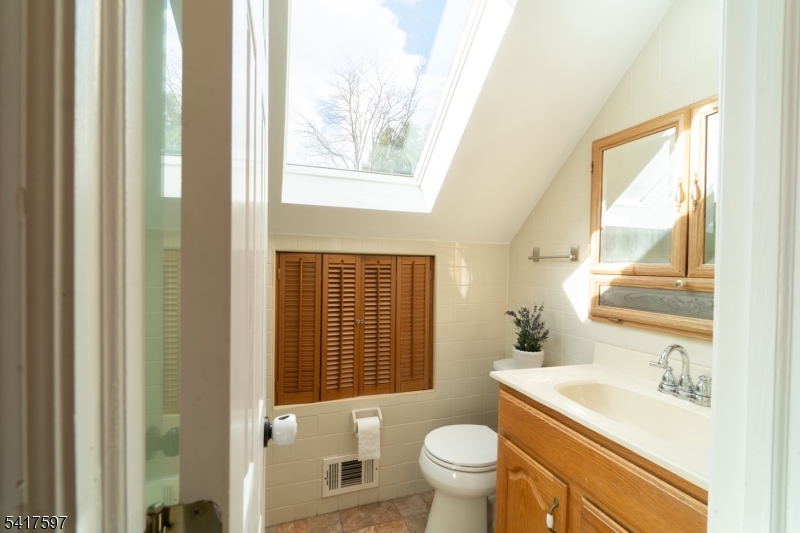 8 Dahlia Road Somerset, NJ 08873 - Photo 34 of 41 a bathroom with a sink toilet and tub