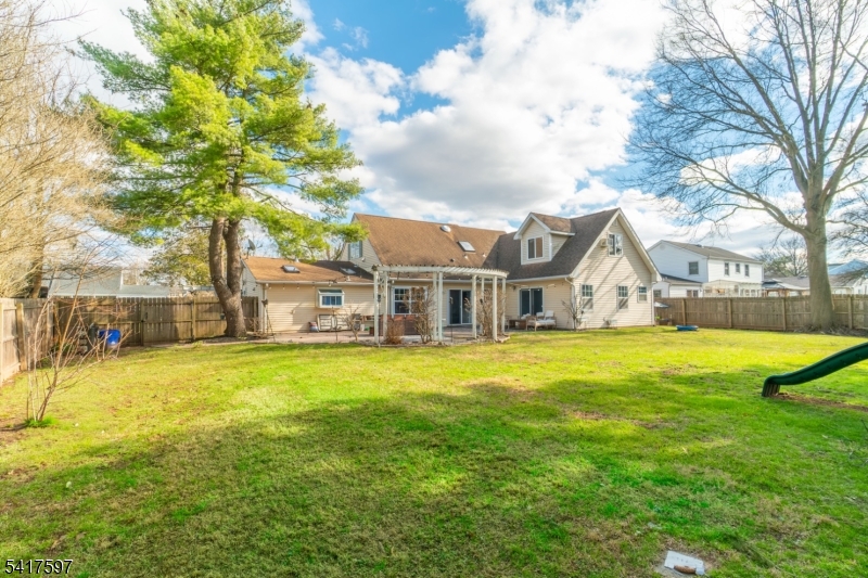 8 Dahlia Road Somerset, NJ 08873 - Photo 38 of 41 a front view of house with outdoor space and swimming pool