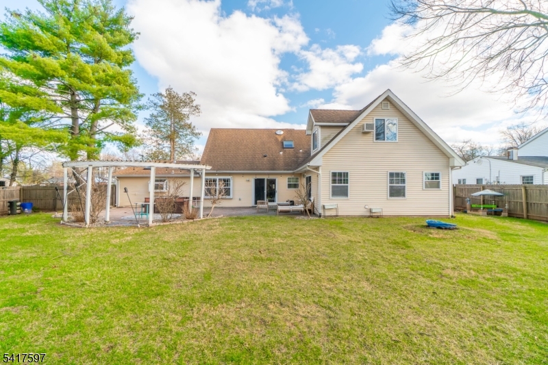 8 Dahlia Road Somerset, NJ 08873 - Photo 39 of 41 a view of a house with a yard and sitting area