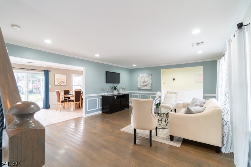 8 Dahlia Road Somerset, NJ 08873 - Photo 5 of 41 a living room with furniture and wooden floor