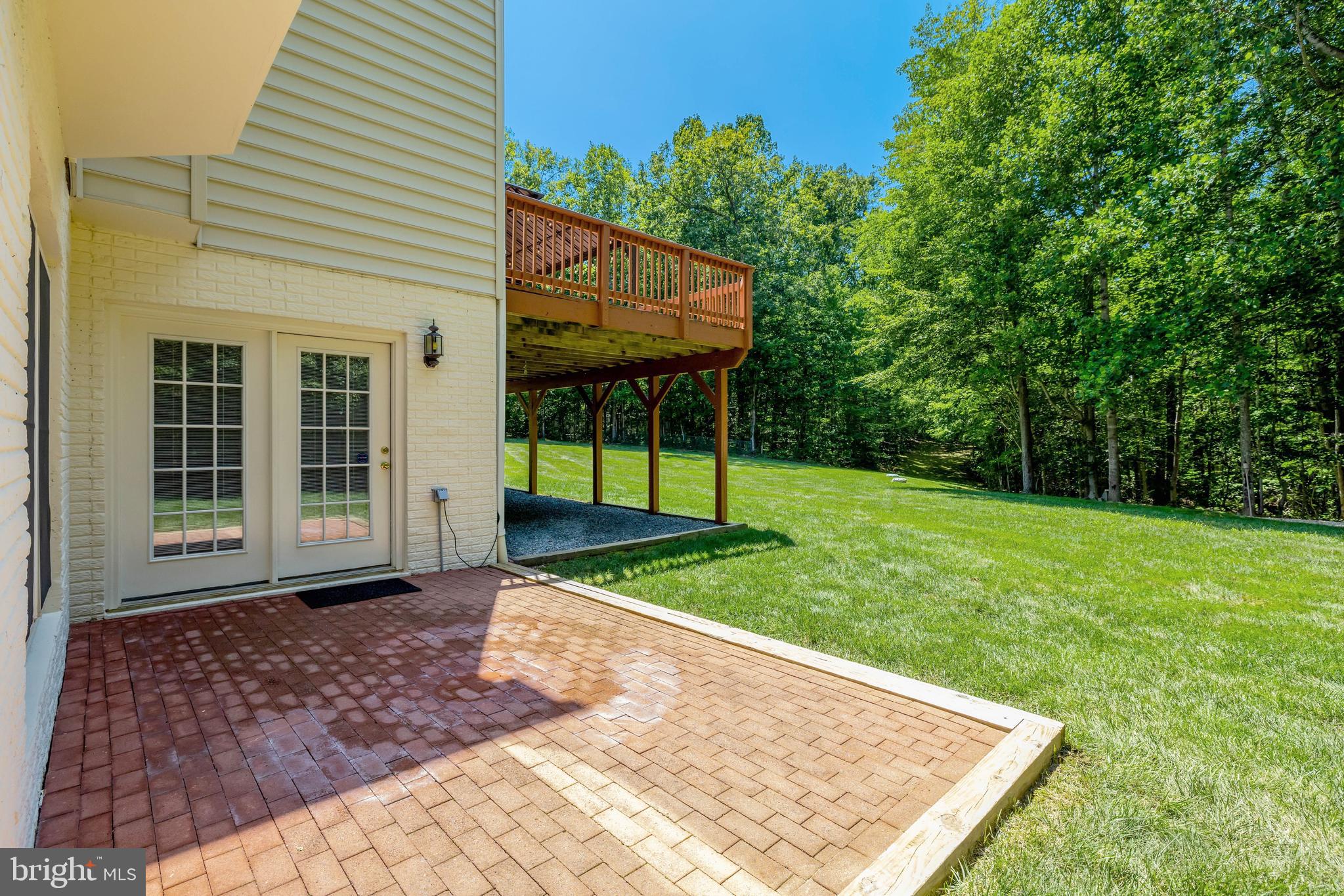 13650 Independence Ridge Nokesville, VA 20181 - Photo 63 of 98 Brick Patio directly beneath the Upper Deck