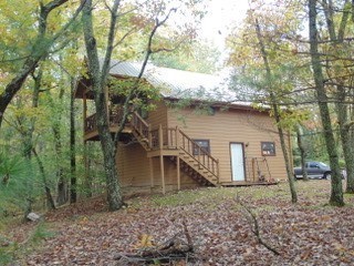 849 North Bluff Circle Monteagle, TN 37356 - Photo 17 of 17 a backyard of a house with lots of green space