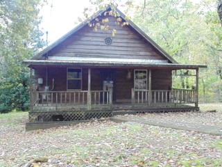 849 North Bluff Circle Monteagle, TN 37356 - Photo 2 of 17 a front view of a house with garden