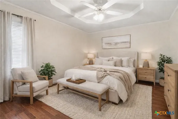 a bedroom with a bed and a couch