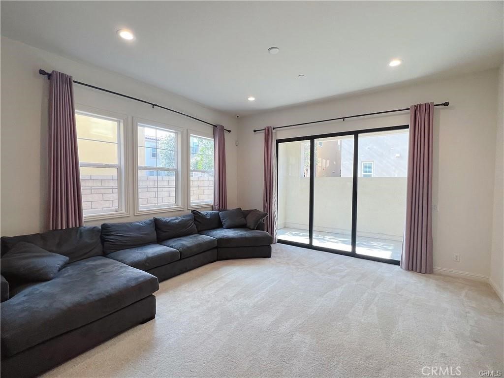 185 Bryce Run Lake Forest, CA 92630 - Photo 14 of 34 a living room with furniture and large windows