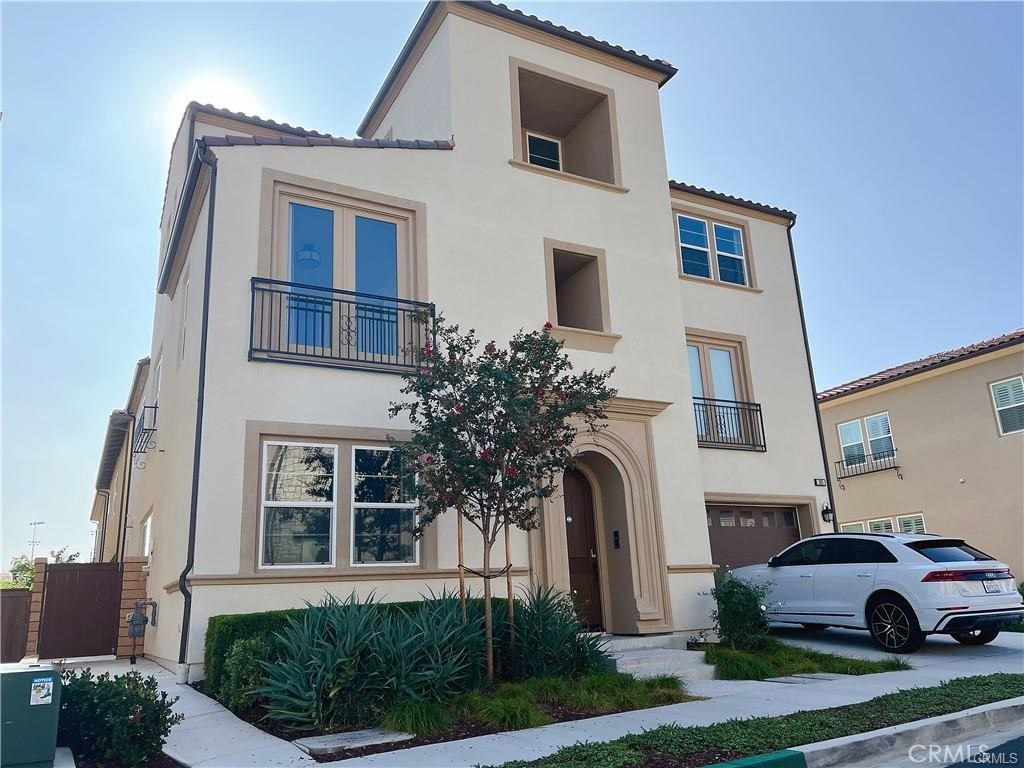 185 Bryce Run Lake Forest, CA 92630 - Photo 2 of 34 a front view of residential houses with yard