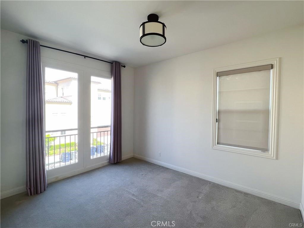185 Bryce Run Lake Forest, CA 92630 - Photo 27 of 34 an empty room with windows and closet