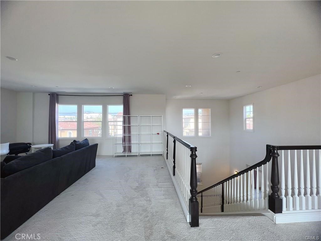 185 Bryce Run Lake Forest, CA 92630 - Photo 30 of 34 a living room with furniture and windows