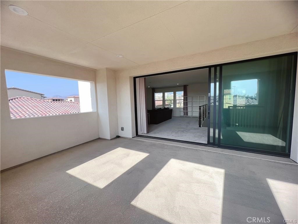 185 Bryce Run Lake Forest, CA 92630 - Photo 33 of 34 a view of a big room with windows and chandelier