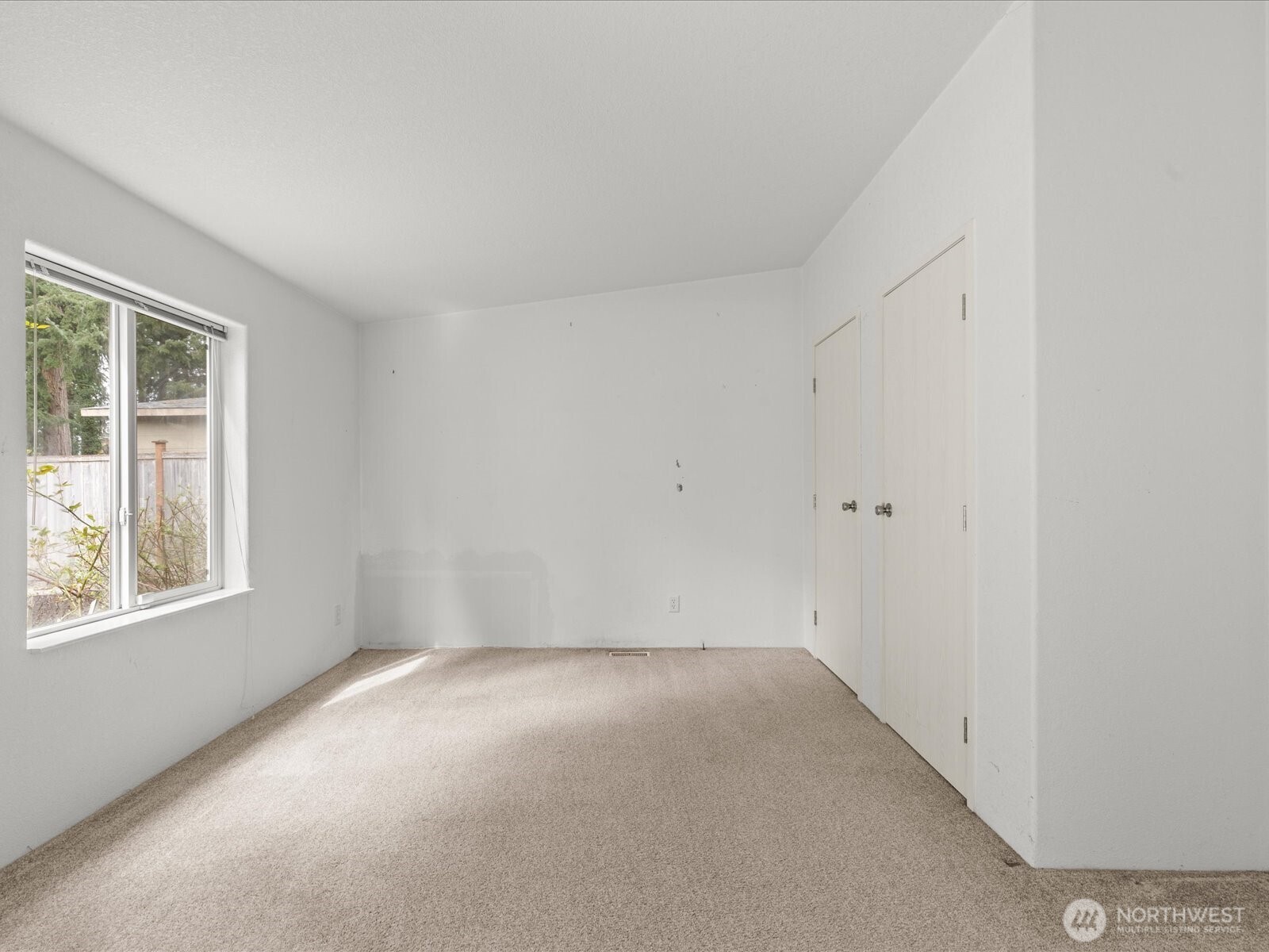 20524 32nd Drive Southeast Bothell, WA 98012 - Photo 21 of 39 an empty room with windows