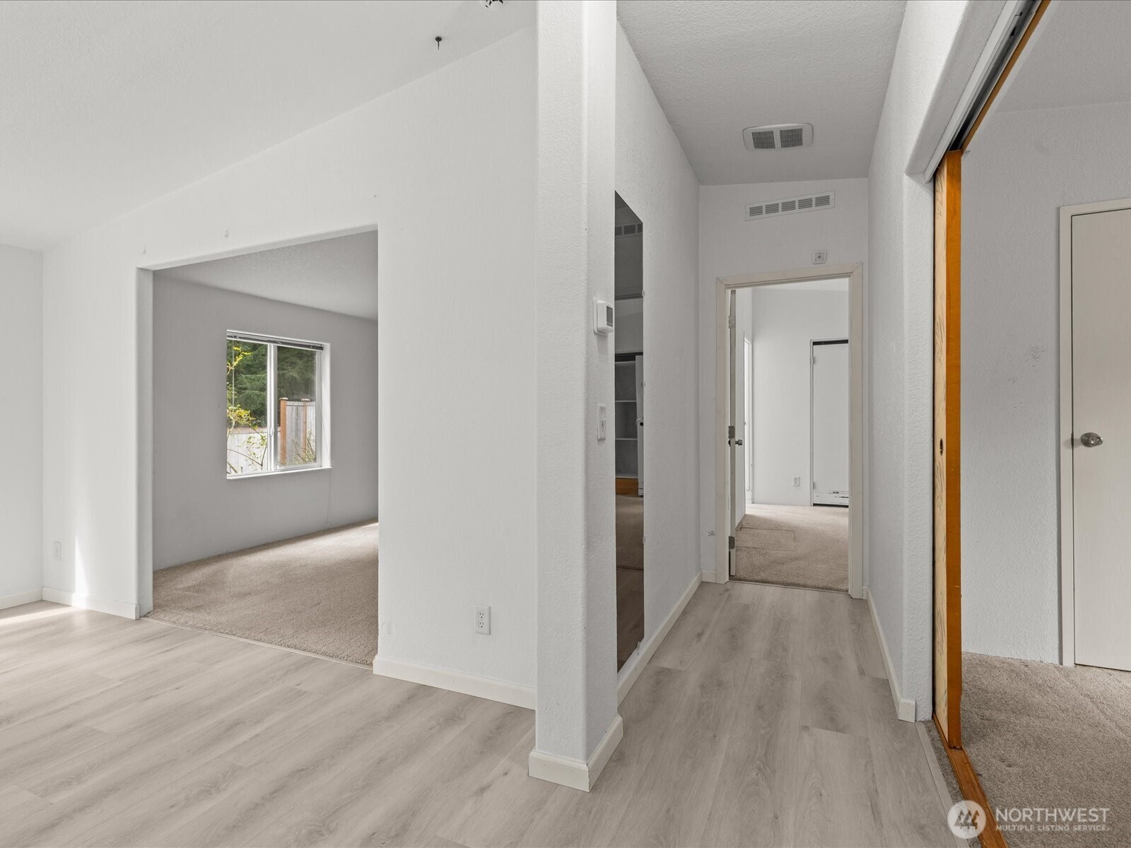 20524 32nd Drive Southeast Bothell, WA 98012 - Photo 23 of 39 a view of a hallway with wooden floor