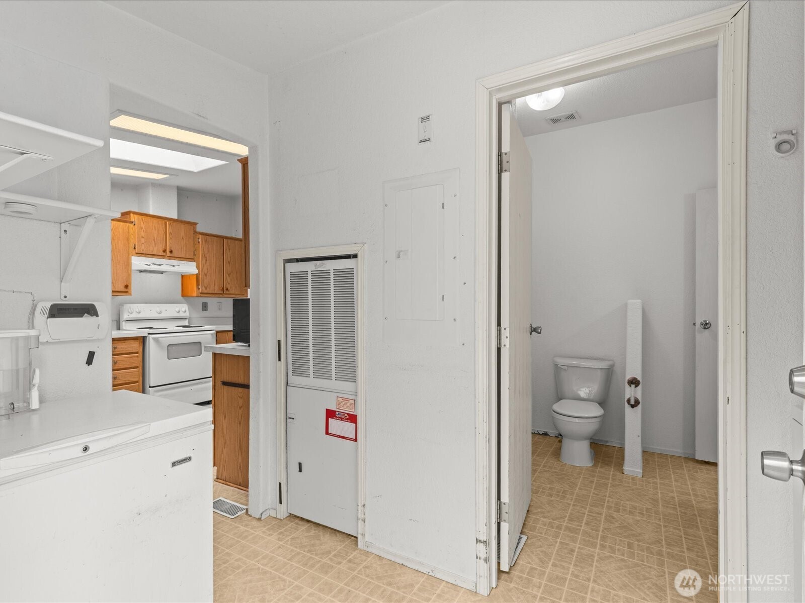 20524 32nd Drive Southeast Bothell, WA 98012 - Photo 24 of 39 a bathroom with a toilet sink and mirror