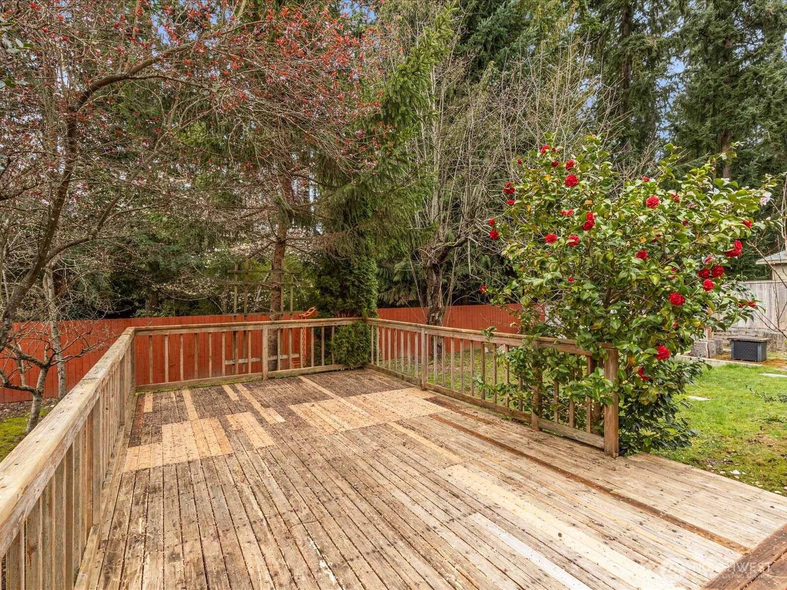 20524 32nd Drive Southeast Bothell, WA 98012 - Photo 35 of 39 a view of balcony with wooden floor and fence