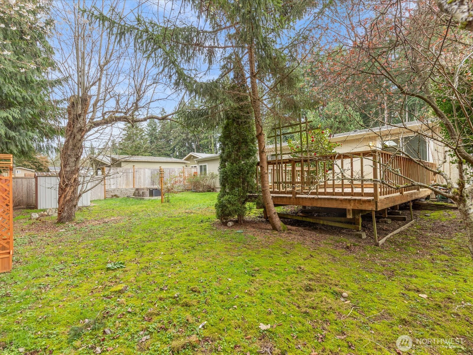 20524 32nd Drive Southeast Bothell, WA 98012 - Photo 38 of 39 a backyard of a house with table and chairs