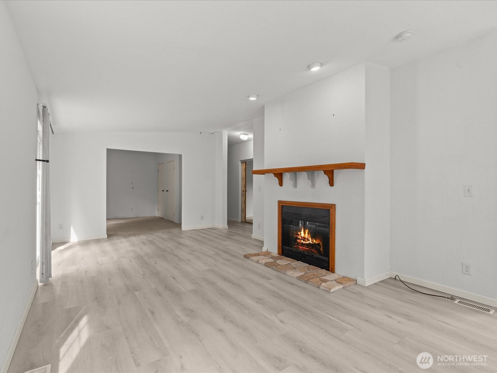 20524 32nd Drive Southeast Bothell, WA 98012 - Photo 6 of 39 a view of an empty room with fire place and fire place