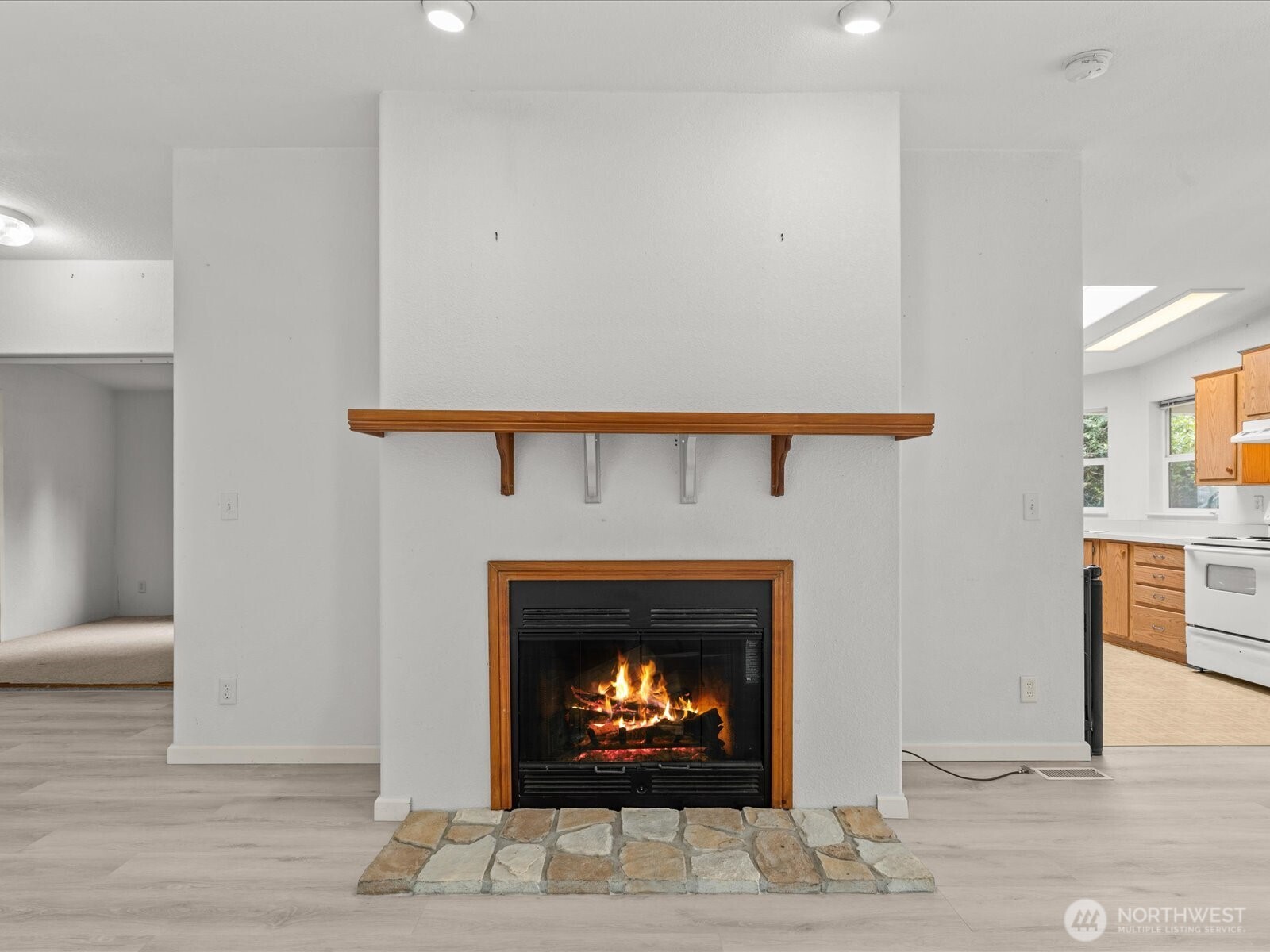 20524 32nd Drive Southeast Bothell, WA 98012 - Photo 8 of 39 a living room with furniture and a fireplace