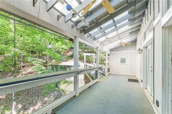 a view of an empty room with a large window