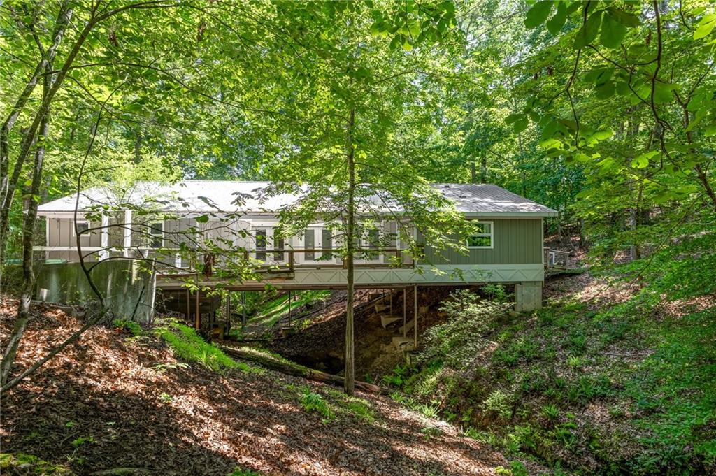 6567 Tahiti Way Flowery Branch, GA 30542 - Photo 36 of 36 a view of a garden