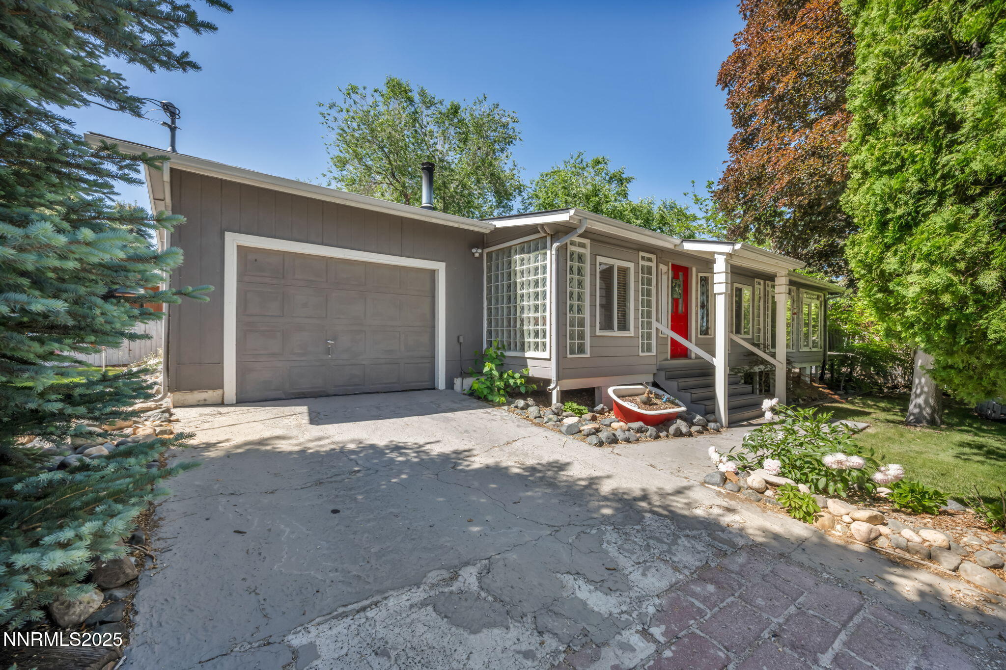 15333 Kivett Lane Reno, NV 89521 - Photo 3 of 38 a view of a house with backyard and sitting area